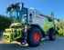 Claas Trion 650 mit Schneidwerk Bild 1