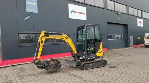 New Holland E22d Ähnlich Wie Eurocomach Mit Löffelpaket Anul fabricaţiei 2023 Hamburg