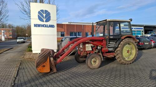 Case IH 633 Frontlader Mit Dunggabel Und Schaufel Încărcător frontal Anul fabricaţiei 1983